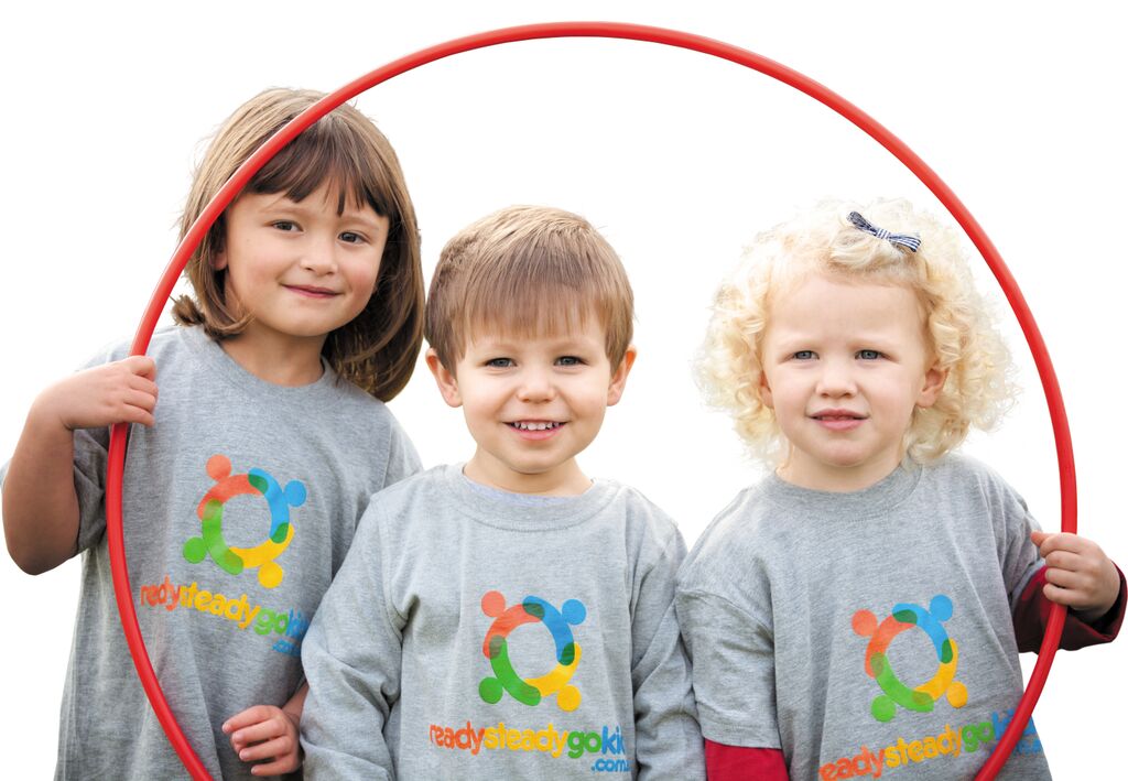 Prof - hoop with 3 kids.jpg